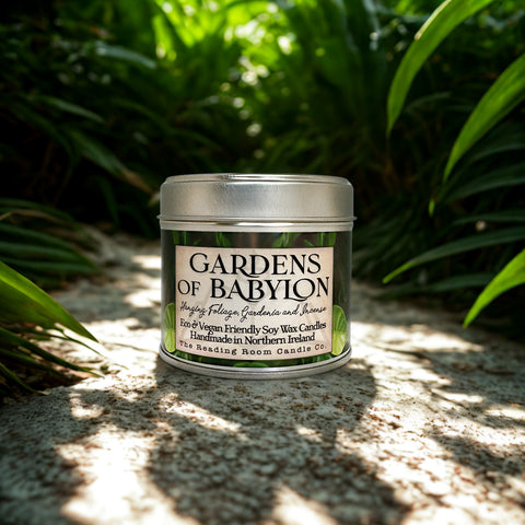 Candle jar labeled 'Gardens of Babylon' on a natural background