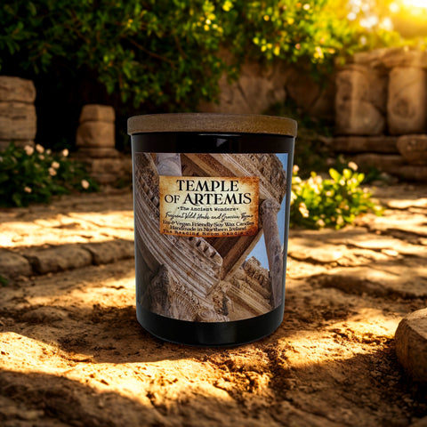 Candle labeled 'Temple of Artemis' on a stone path with greenery in the background