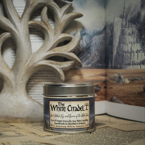 Soy Wax Candle tin labeled 'The White Citadel' on a rustic background with the white tree.