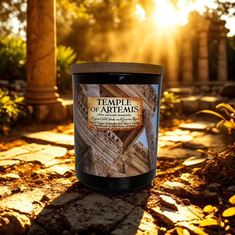 Candle labeled 'Temple of Artemis' in a natural setting with sunlight